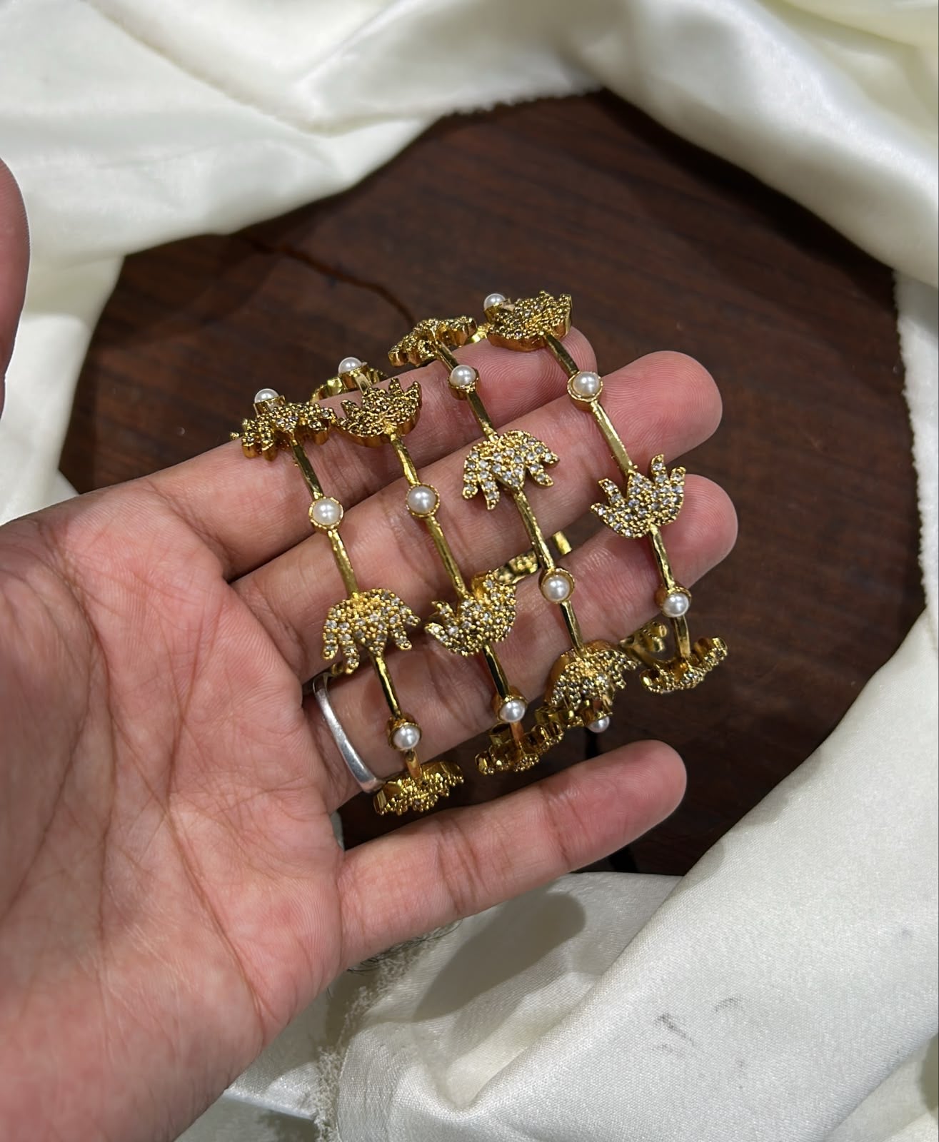 Lotus and pearl bangles