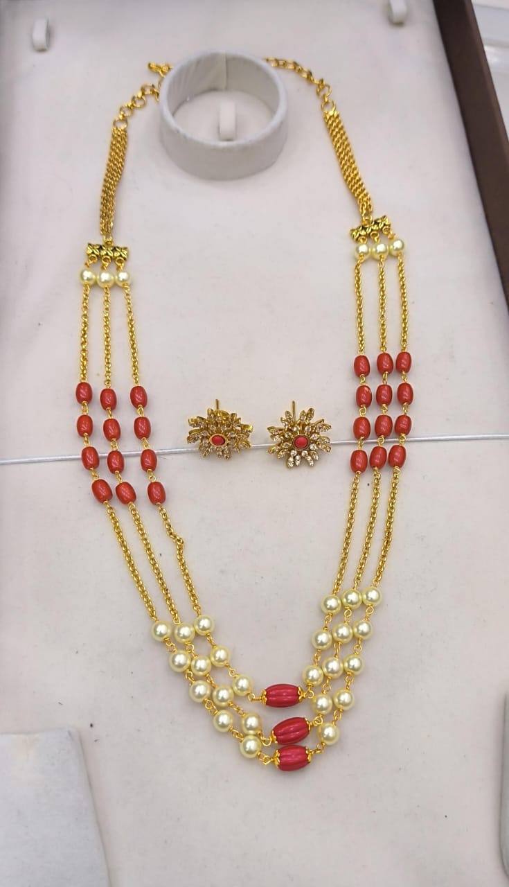 Ruby with gold chain