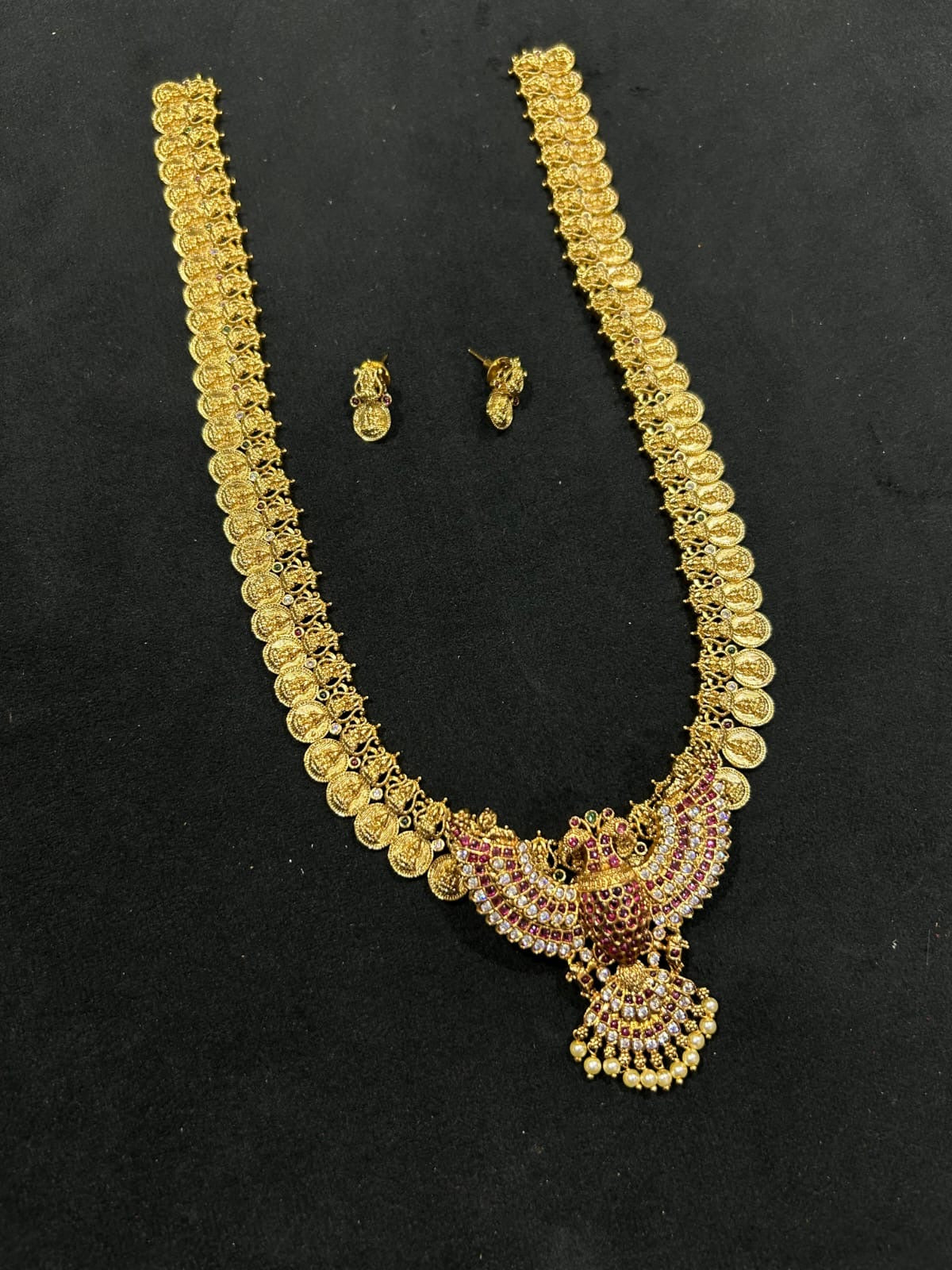 Coin haram with pendent