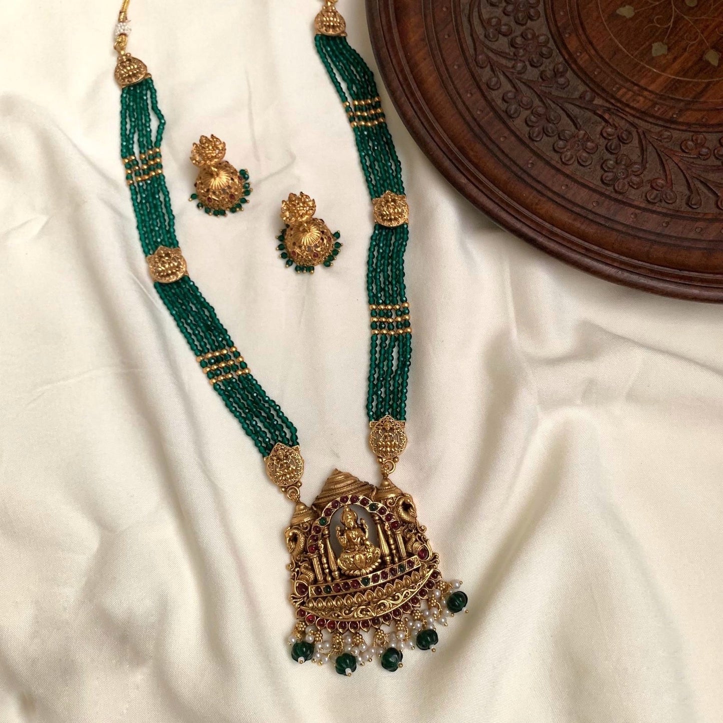 Green with gold beads haram