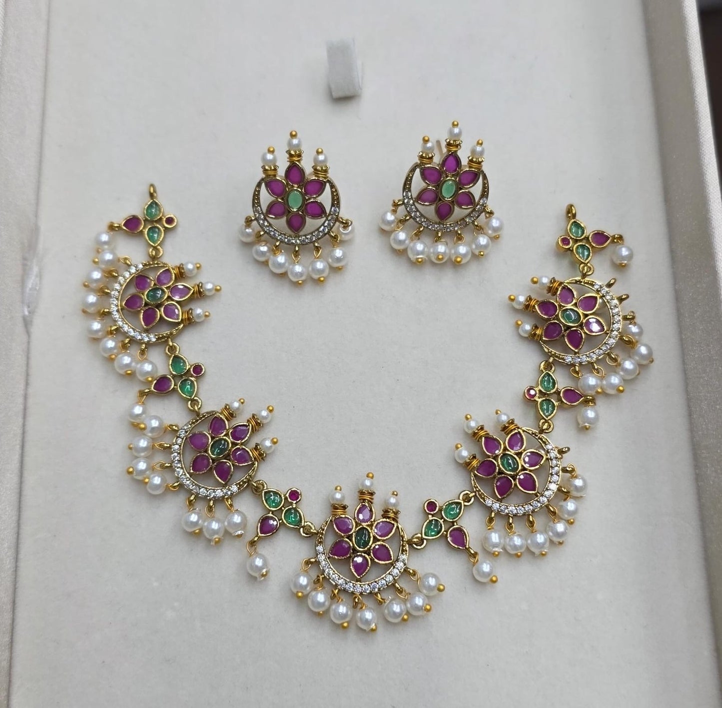 Flower with half moon design