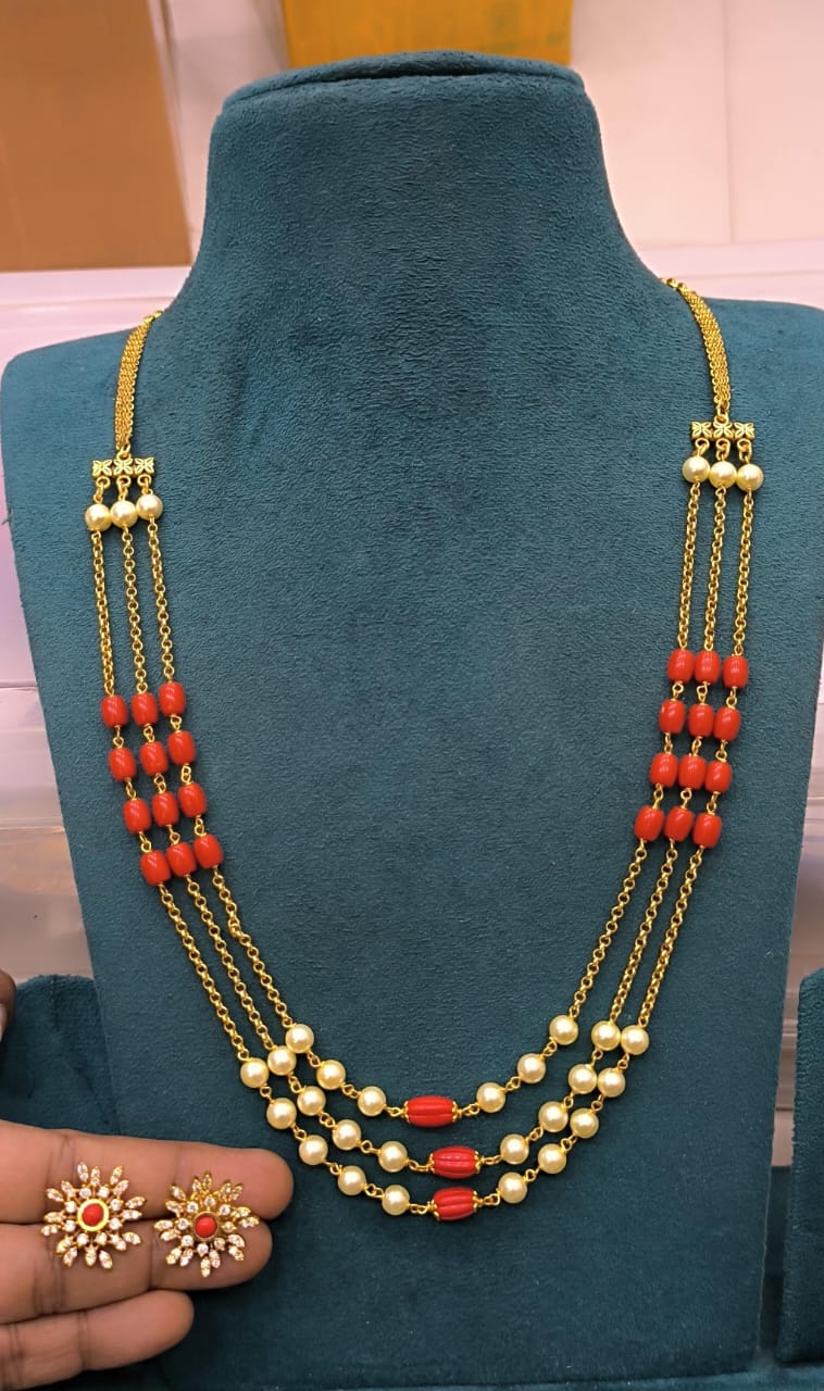 Ruby with gold chain