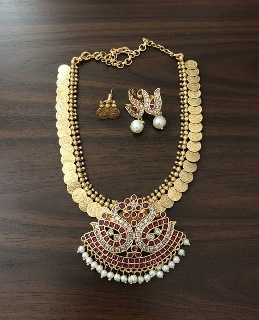 Coin with swan pendent