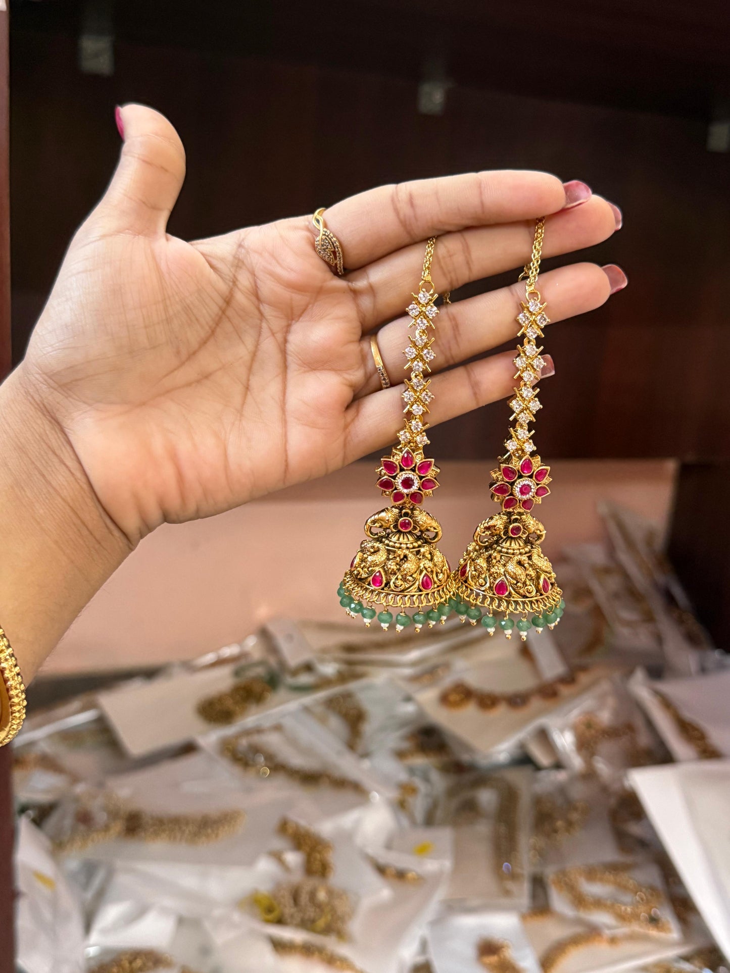 Grand jumka with ear chain