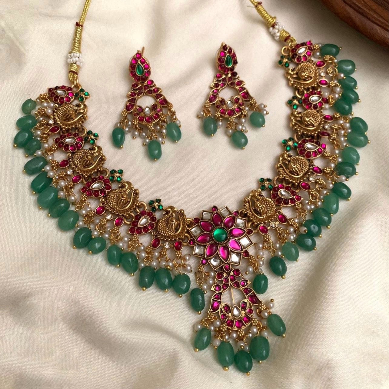Ruby and green beads necklace