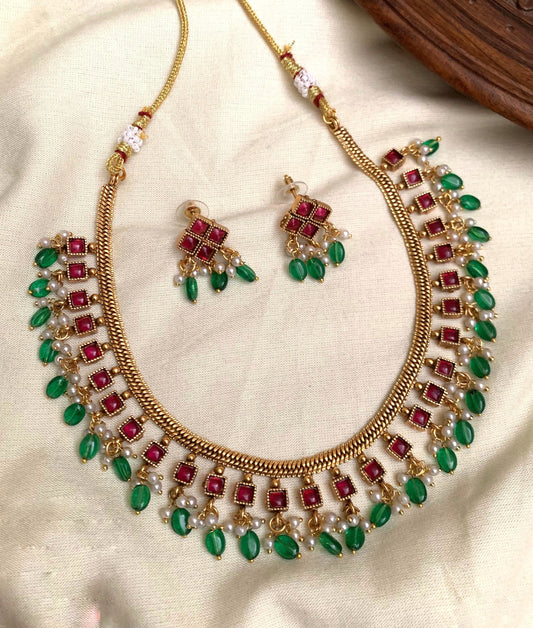 Green and red necklace