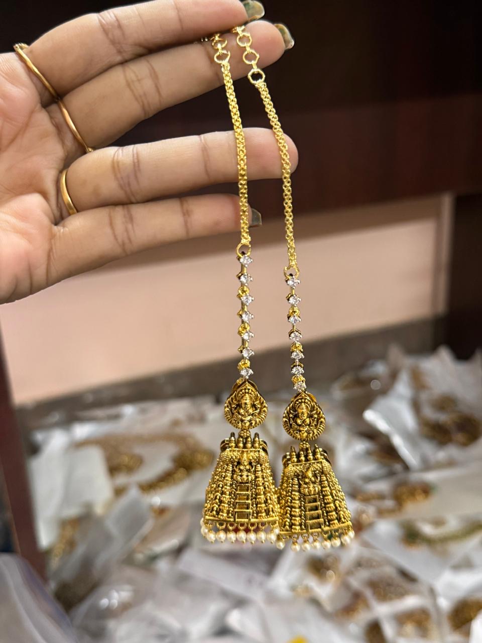 Temple earring with ear chain